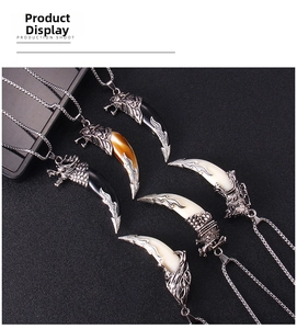 Detailed close-up of retro wolf head charms on stainless steel ethnic necklaces
