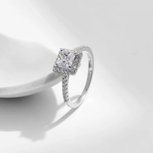 Elegant S925 sterling silver ring with square-cut cubic zirconia in a halo setting