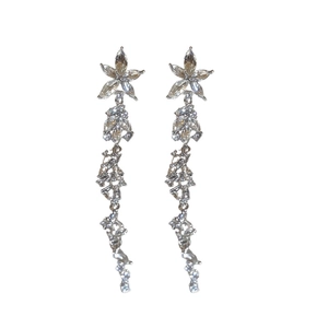 Elegant long silver-colored tassel earrings with sparkling diamond-set flower design