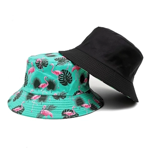 Reversible bucket hat with black and tropical flamingo print for sun protection
