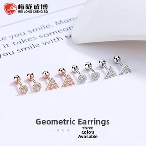 Detail view of 925 silver flower and star screw-back studs with sparkling zircon stones