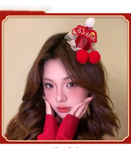 Detail of red festive sequin mini hat hair clip with lace and white pom-poms