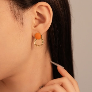Vintage orange enamel round stud earrings with nested gold rings for women fashion