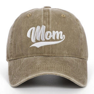 Detail of white Mom embroidery on a washed khaki cotton baseball cap for Mother's Day