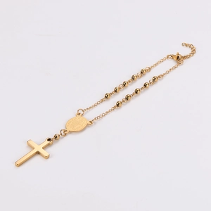 Adjustable golden stainless steel bracelet with cross pendant and religious saint medal