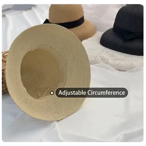 Adjustable woven straw sun hats for women in beige, khaki, and black with ribbon trim