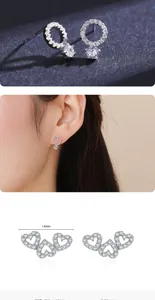 Macro detail of S925 silver heart stud earrings with cubic zirconia and 14mm dimensions