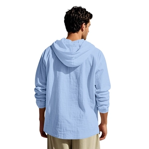 Back view of men's light blue linen hooded shirt showing casual fit and breathable fabric