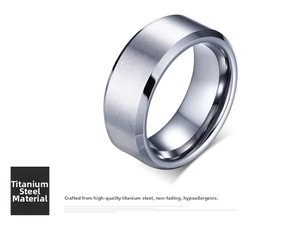 Macro shot of brushed titanium steel ring with beveled edges and matte texture