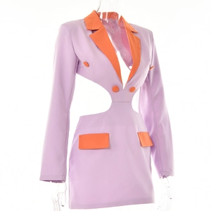 Close-up of color-block dress with orange collar and lavender waist cutout detail
