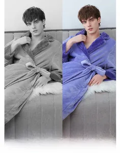 Detail of soft light purple flannel bathrobe featuring tie waist and plush coral fleece texture