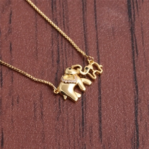 Elegant gold mother and baby elephant necklace with zircon crystals on box chain