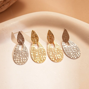 Waterdrop geometric metal earrings in gold and silver with textured finish