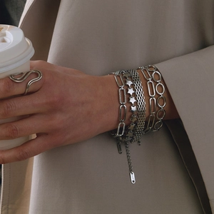 French retro silver metal layered bracelet and minimalist S-shaped ring set for women