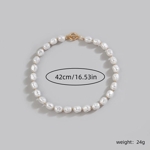Detail view of Baroque pearl necklace measuring 42cm length and weighing 24g with toggle clasp