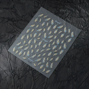 5D bronzing gold nail stickers featuring deep blue feathers with embossed texture