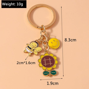 Detailed view of sunflower, bee, and smiley charms with specific size measurements