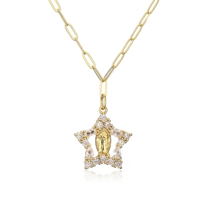 Golden star pendant necklace with cubic zirconia and paperclip chain on white background