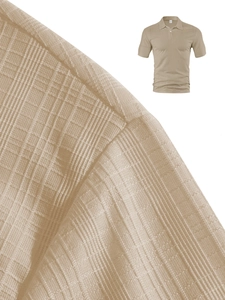 Macro shot of khaki polo shirt showing waffle knit fabric texture and shoulder seam detail