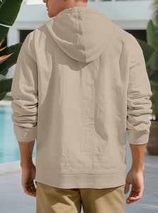 Detail view of khaki cotton hoodie with drawstring hood and micro-textured fabric back
