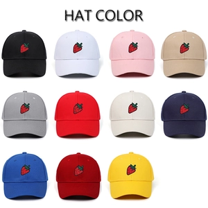 Variety of baseball caps with strawberry embroidery shown in eleven vibrant colors