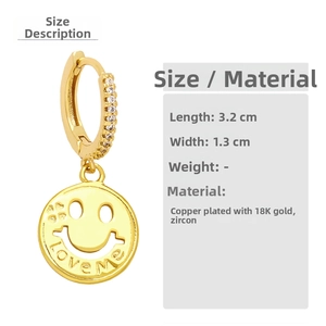 Detailed view of 18K gold plated smiley earrings with LoveMe engraving and zircon stones