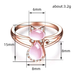 Pink crystal cat-shaped ring in rose gold with white cubic zirconia accents
