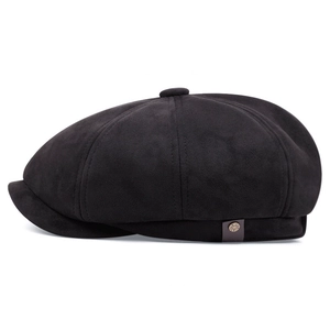 Classic black newsboy cap in vintage suede style with side decorative metal badge