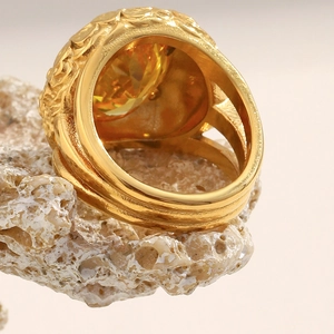 Exaggerated 18K gold plated flower cocktail ring with a large yellow faceted zircon gemstone