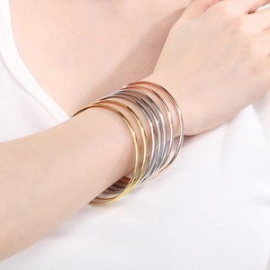 Polished 3.6mm stainless steel stacked bangle bracelets in gold, silver and rose gold