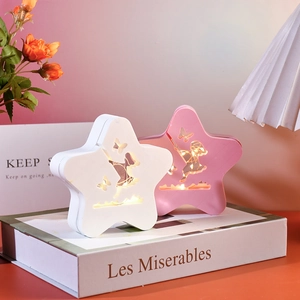 Cajas de almacenamiento con forma de estrella luminosa y luces LED de tono cálido