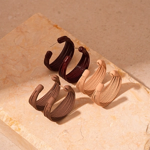 Maillard style C-shaped multi-layered textured stud earrings in three earthy colors
