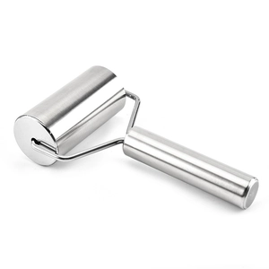 Professional stainless steel rolling pin with metal handle and brushed finish on white surface