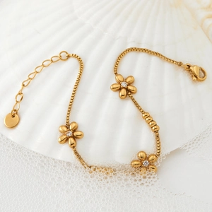 Elegant gold stainless steel flower bracelet with sparkling zircon stones and box chain