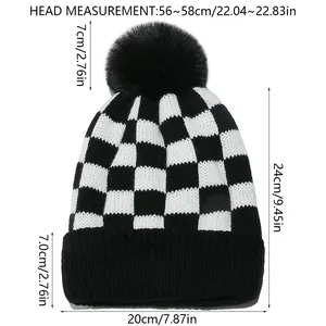 Detailed size chart for checkerboard knit beanie with pompom showing head circumference