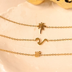 Polished 18k gold plated titanium steel bracelets with pineapple wave and palm tree charms