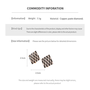 Detail view of geometric diamond earrings with dimensions and material specifications