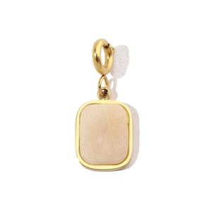 Detail of a minimalist gold clasp holding a rectangular light beige natural stone pendant