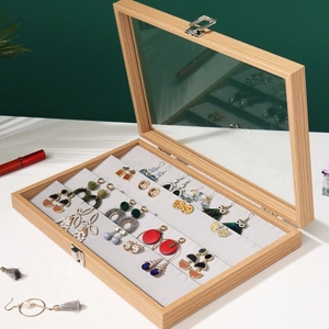 Pear wood grain jewelry display tray with glass lid and soft gray velvet lining