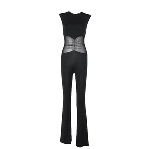 Detail view of black mesh patchwork on sleeveless jumpsuit with flared leg cut