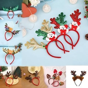 Detail of Christmas reindeer headbands featuring festive plaid patterns and cartoon bears