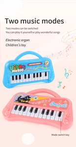 Detalle de piano de juguete multifuncional para niños con teclas y asa de transporte