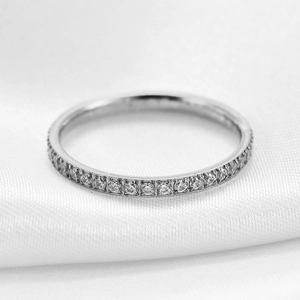 Minimalist 2mm silver stainless steel eternity ring with single row of clear crystals
