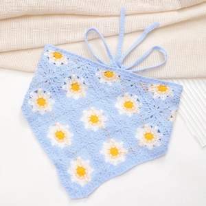 Detailed knit texture of light blue floral crochet triangle headscarf with daisies