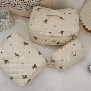 Three-piece set of cream corduroy storage bags with cute brown bear and polka dot patterns