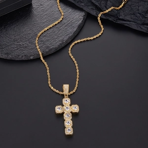 Gold plated cross pendant necklace with micro paved cubic zirconia on twist chain