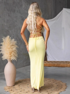 Sexy yellow backless maxi dress with crossover lace-up design and slim fit silhouette