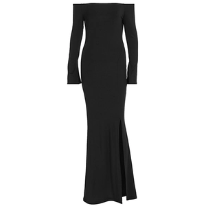 Detail of elegant off-the-shoulder black maxi dress with side slit and long sleeves