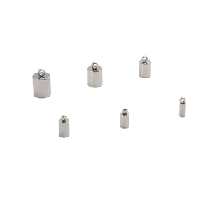 Detail showing six sizes of metallic cylindrical cord ends with loops for DIY jewelry making