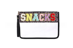 Detail of waterproof PVC bag with chenille letter patches and leopard print accents